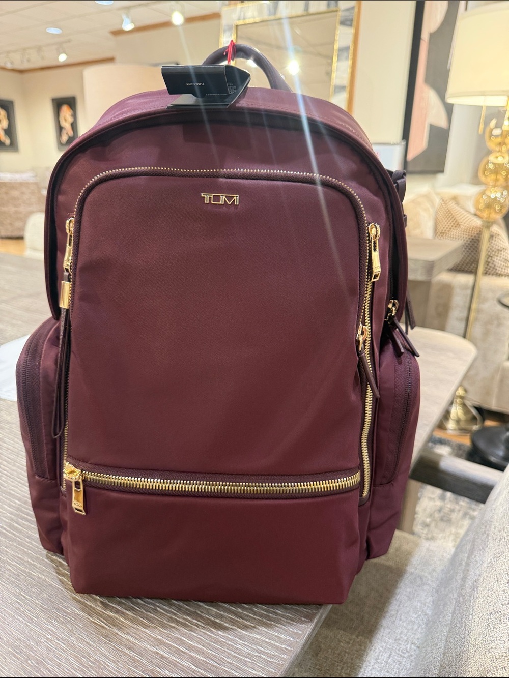 Tumi Burgundy Backpack with Gold Hardware